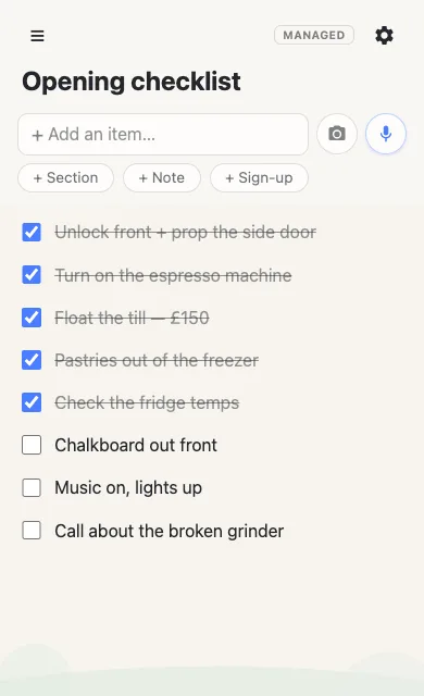 An opening checklist on a phone: five items ticked off and struck through, two still open, and a
           one-off item added at the bottom reading 'Call about the broken grinder'.