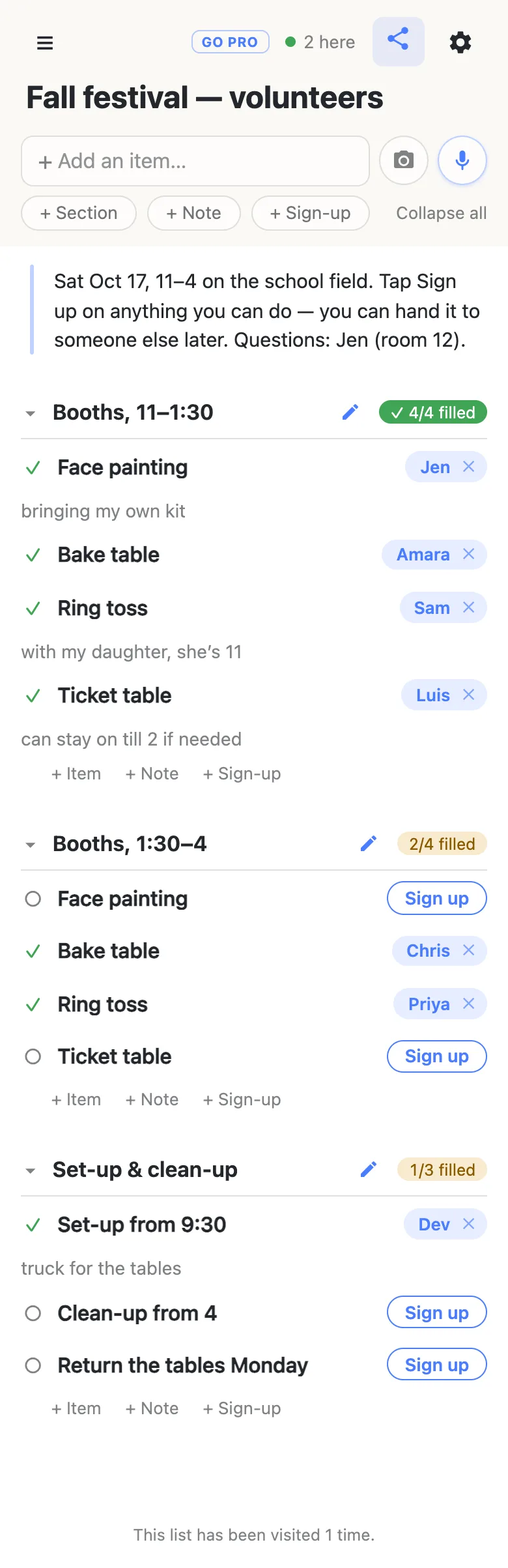A phone showing a list titled “Fall festival — volunteers”, with a presence chip reading “2 here”. A note at the top reads “Sat Oct 17, 11–4 on the school field. Tap Sign up on anything you can do — you can hand it to someone else later. Questions: Jen (room 12).” A section headed “Booths, 11–1:30” shows a green 4/4 filled counter: face painting claimed by Jen with the note “bringing my own kit”, bake table by Amara, ring toss by Sam with the note “with my daughter, she’s 11”, and ticket table by Luis, noting “can stay on till 2 if needed”. A second section, “Booths, 1:30–4”, reads 2/4 filled: face painting still showing a blue Sign up button, bake table claimed by Chris, ring toss by Priya, ticket table open. A third section, “Set-up & clean-up”, reads 1/3 filled — set-up from 9:30 claimed by Dev with the note “truck for the tables”, and clean-up and returning the tables still open.