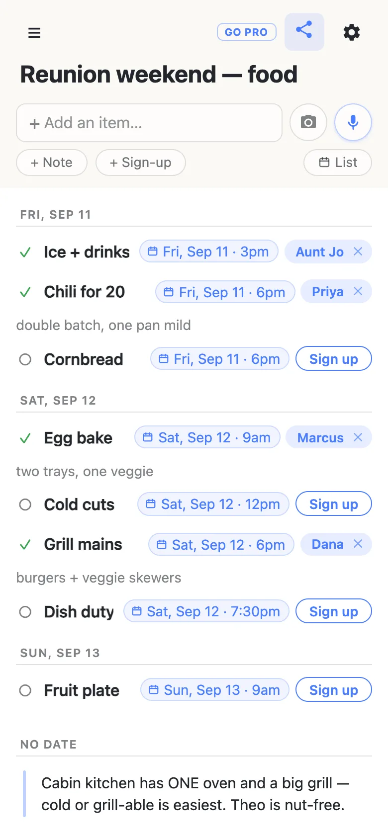 The same sheet in agenda view on a phone: headings for FRI, SEP 11 with the ice run and chili, SAT, SEP 12 with the egg bake, cold cuts, grill mains and dish duty in time order, SUN, SEP 13 with the fruit plate, and a NO DATE heading holding the kitchen note.