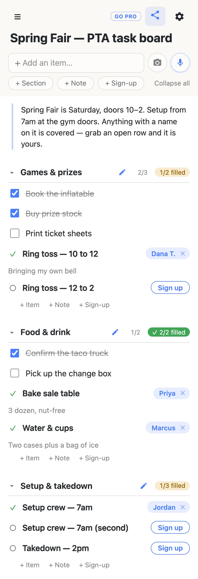 A phone showing a list titled “Spring Fair — PTA task board”. A note at the top gives the doors and setup times. Three committee sections follow: Games & prizes reads 2/3 with an amber 1/2 filled and mixes ticked tasks with a ring-toss shift claimed by Dana T.; Food & drink reads 1/2 with a green 2/2 filled, with bake sale and water claimed by Priya and Marcus; Setup & takedown reads 1/3 filled, with one shift claimed by Jordan and two showing Sign up buttons.