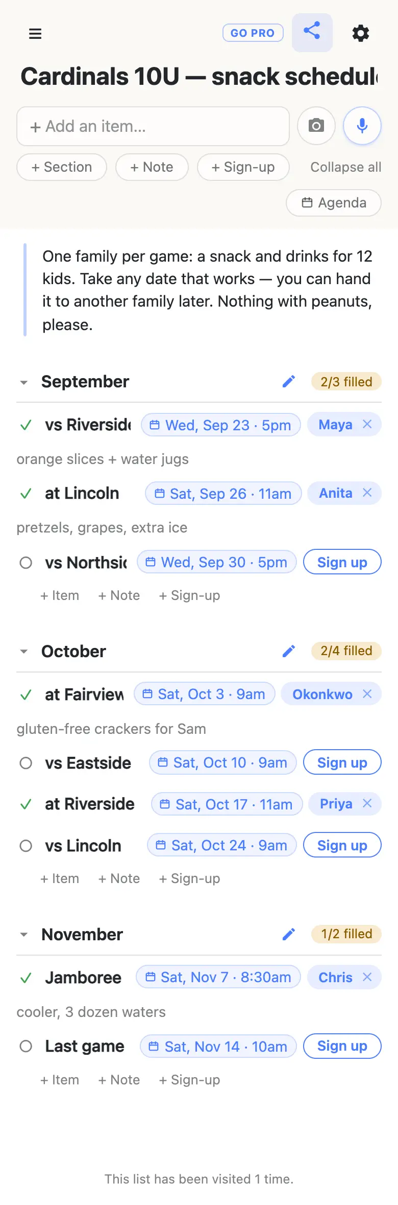 A shared list titled “Cardinals 10U — snack schedule” on a phone. A note at the top reads “One family per game: a snack and drinks for 12 kids.” Three sections follow. September reads 2/3 filled: vs Riverside on Wed, Sep 23 · 5pm taken by Maya with the note “orange slices + water jugs”, at Lincoln on Sat, Sep 26 · 11am taken by Anita with “pretzels, grapes, extra ice”, and vs Northside on Wed, Sep 30 · 5pm still showing a Sign up button. October reads 2/4 filled and November 1/2 filled.